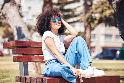 Buy stock photo Fashion, sunglasses and happy woman at park bench in city for style, trendy and vision. African girl, cool and relax outdoor or thinking of streetwear or reflection with urban accessory in summer