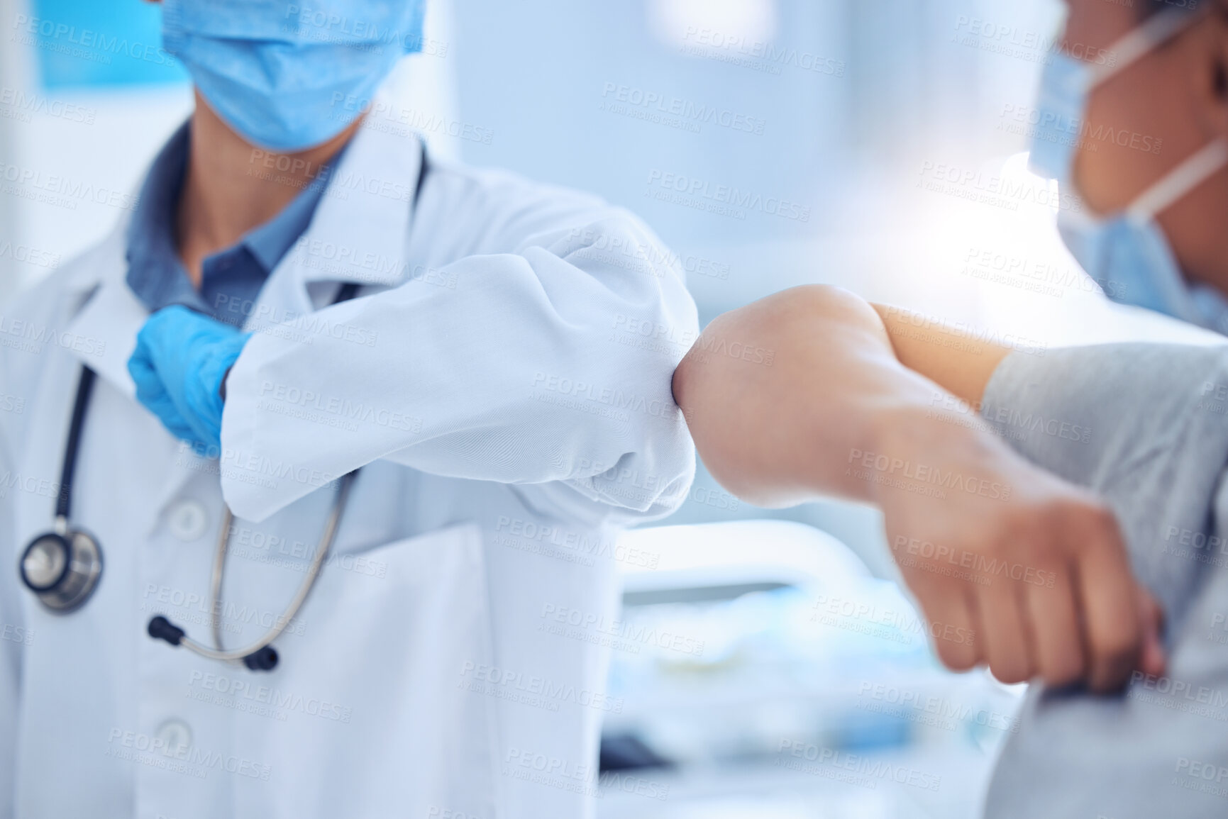 Buy stock photo Doctor, patient and elbow bump greeting in hospital for meeting and checkup for healthcare closeup. Social distancing, medical mask and people with handshake for safety, protection or prevent covid