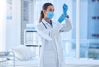 Buy stock photo Doctor, syringe and bottle in hospital for healthcare, vaccine and required dosage for Covid 19 remedy. Woman, specialist and vial in clinic with PPE, medicine and antigen development in pandemic