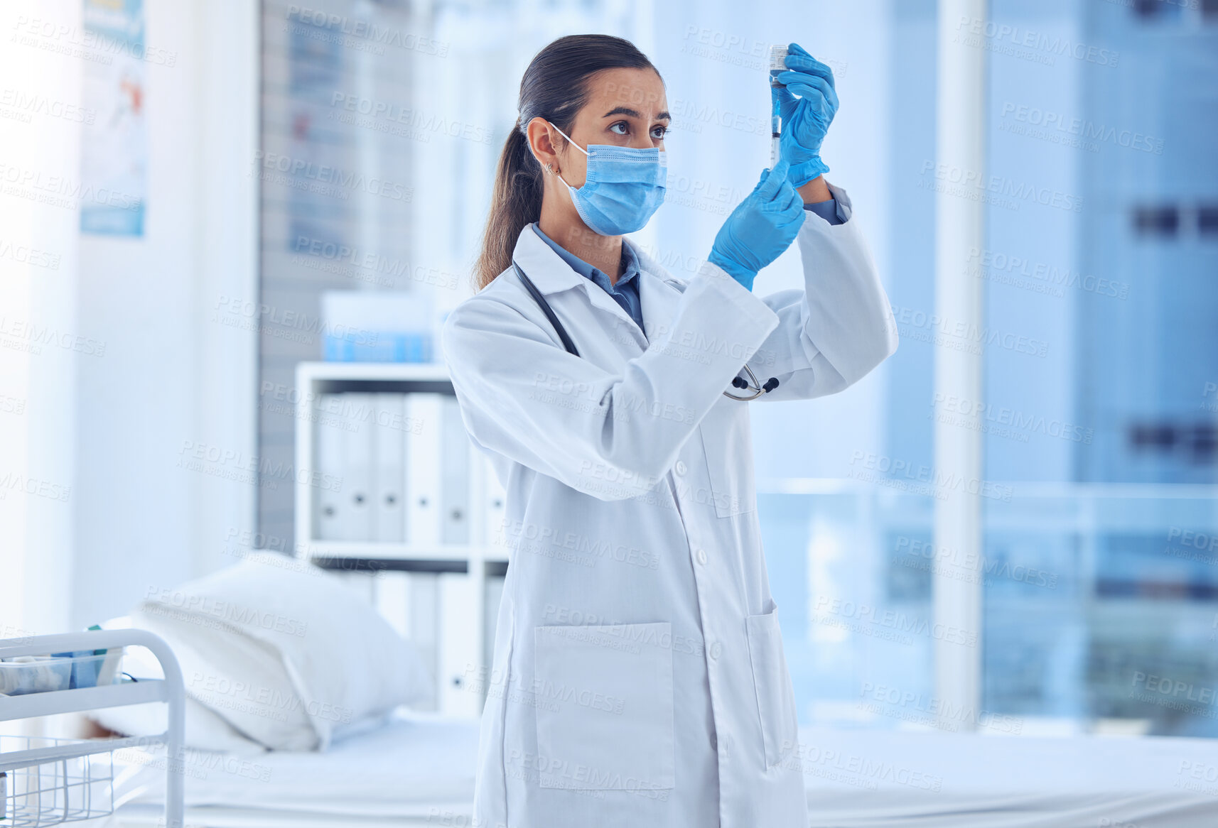 Buy stock photo Doctor, syringe and bottle in hospital for healthcare, vaccine and required dosage for Covid 19 remedy. Woman, specialist and vial in clinic with PPE, medicine and antigen development in pandemic