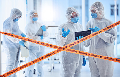 Buy stock photo PPE, talking and scientist with tablet, research and yellow tape for caution in hospital, people or online. Science, biohazard and medical professional in clinic, investigation or outbreak of disease