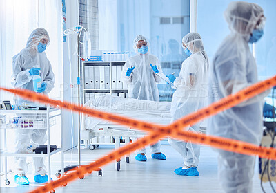 Buy stock photo Biohazard, protection and people with disinfection in hospital for contamination, safety and protocol. Medical, red tape and work with PPE in ward for healthcare, sanitation and infection control