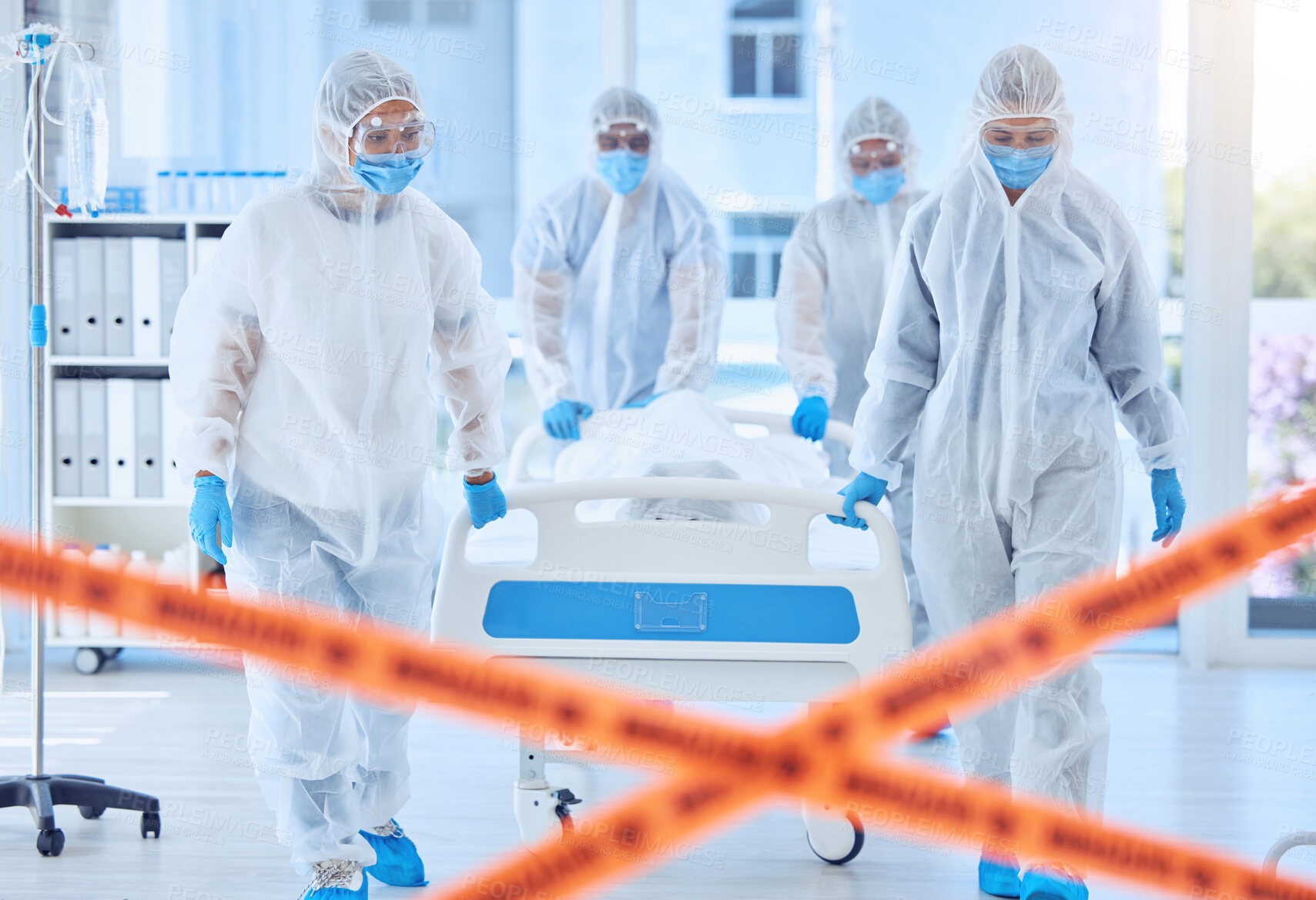 Buy stock photo PPE, medical team and doctors with body, disease and yellow tape for caution in hospital, safety and mask. Science, people and dead patient in clinic, danger and outbreak of virus and biohazard