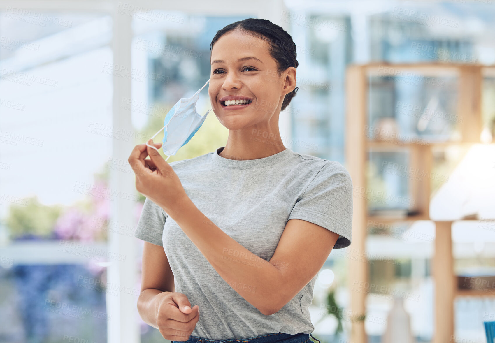 Buy stock photo Happy woman, remove and vaccine with face mask for healthcare, recovery or end of covid at home. Young female person with smile for protection, health and safety in post pandemic or medicare at house