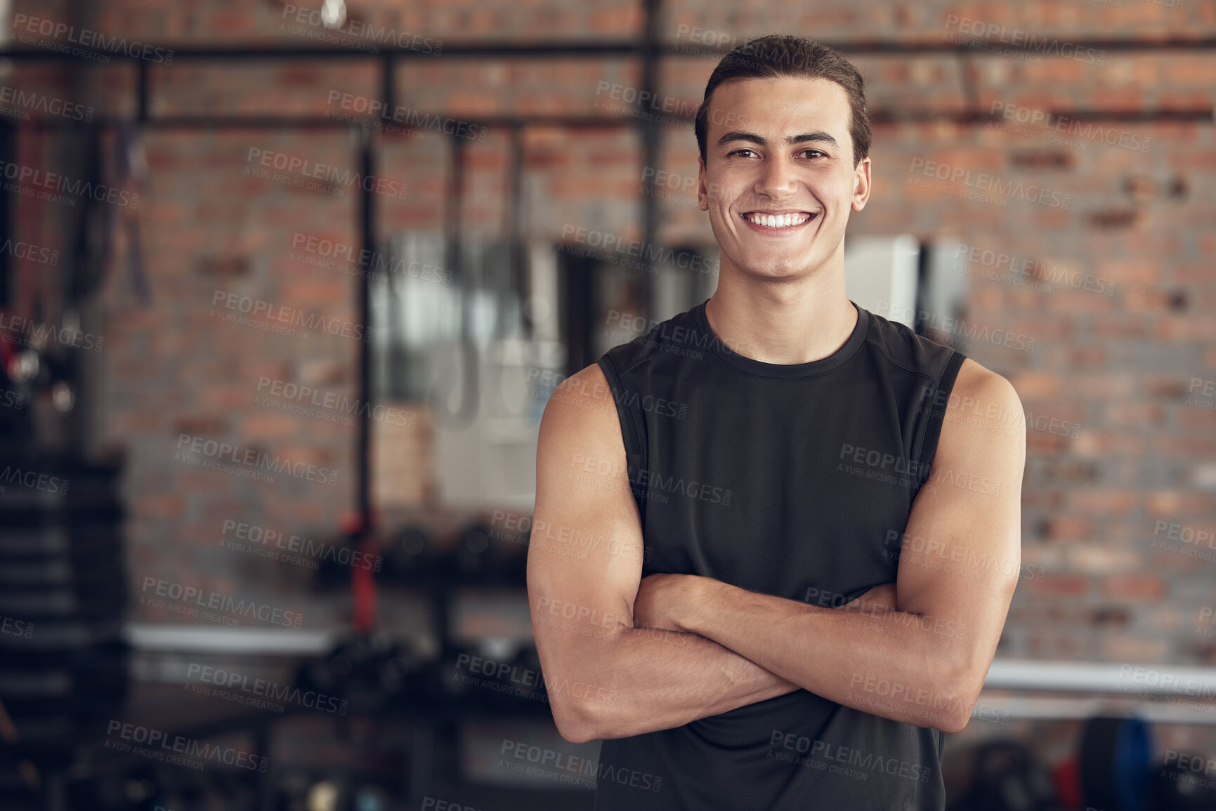 Buy stock photo Man, portrait and confident in gym for fitness or daily workout routine, muscle growth and development. Male person, arms crossed and happy with pride in studio for exercise, cardio and training.