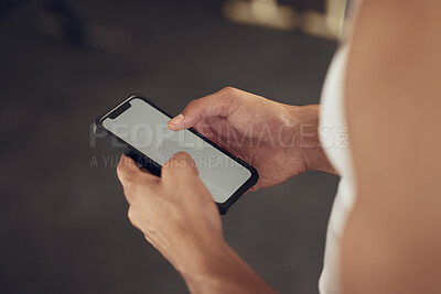 Buy stock photo Person, hands and phone with screen at gym for tracking workout progress, exercise app or reading notification. Athlete, fitness and smartphone at sports club for training website and wellness tips