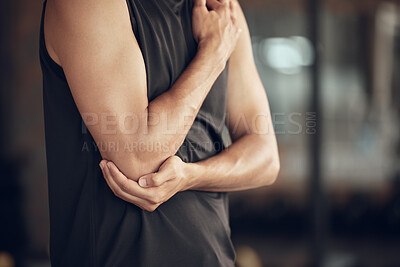 Buy stock photo Man, fitness and elbow injury with pain, muscle tension or inflammation from accident at gym. Closeup of male person with sore joint, broken bone or sprain from discomfort, workout or indoor exercise