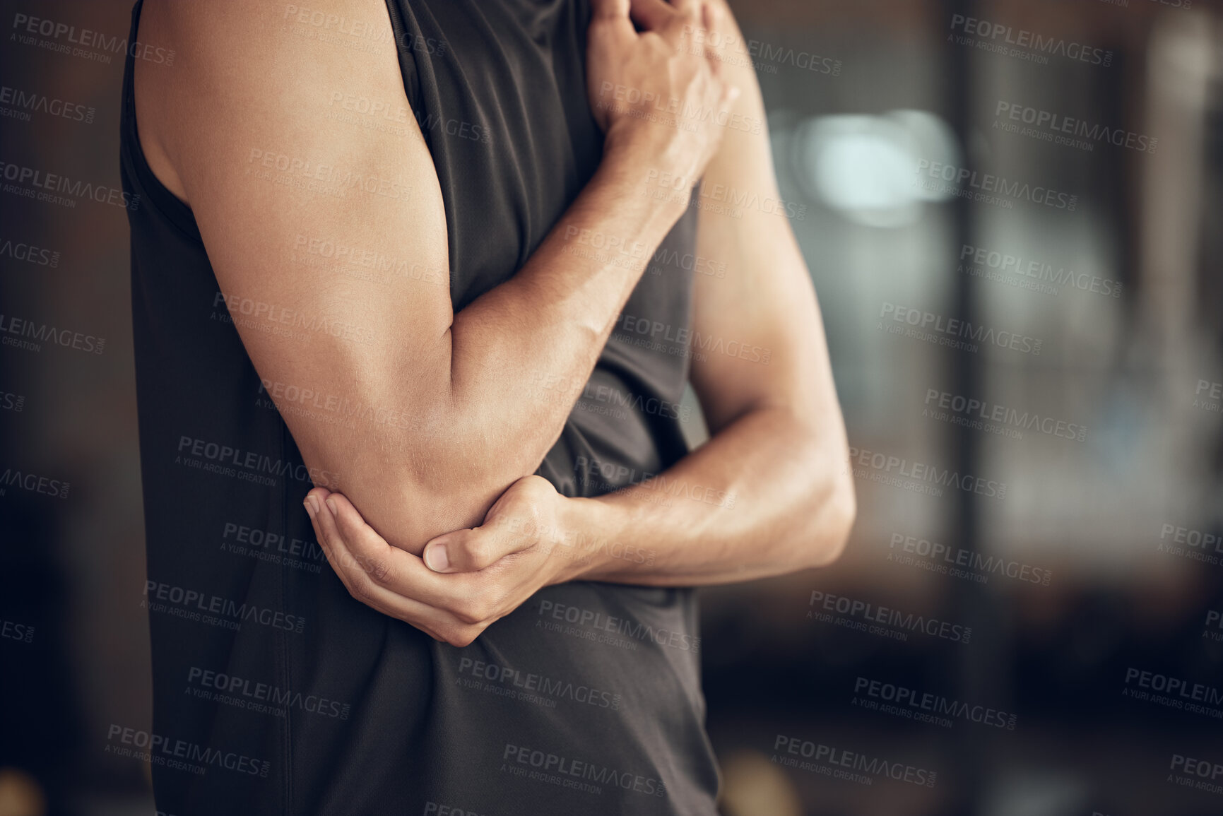 Buy stock photo Man, fitness and elbow injury with pain, muscle tension or inflammation from accident at gym. Closeup of male person with sore joint, broken bone or sprain from discomfort, workout or indoor exercise