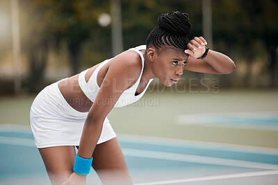 Buy stock photo Tired, tennis player and black woman with burnout, court and fitness with training, wellness and match. African person, athlete and professional with workout, practice and exhausted with competition