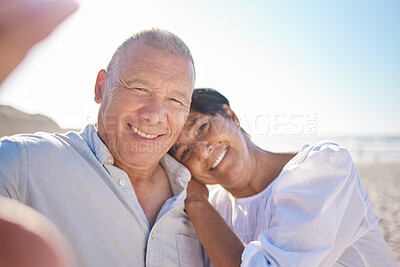 Buy stock photo Senior, couple and portrait with selfie on beach for travel documentation on anniversary trip, getaway and journey. Elderly man, woman and happy with photography by ocean for social media and memory.