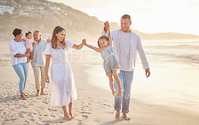 Buy stock photo Beach, family and parents lifting child on vacation, adventure or getaway together for bonding by sea. Happy, generations and children with grandparents and mom and dad for fun by ocean on holiday.