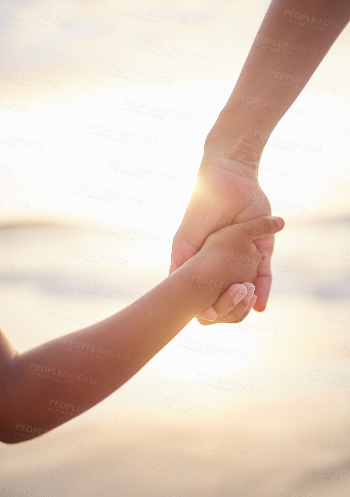 Buy stock photo Sunset, parent and kid with holding hands on beach, security and bonding together with safety. Holiday, vacation and support in California for person, child or connection as family on adventure break