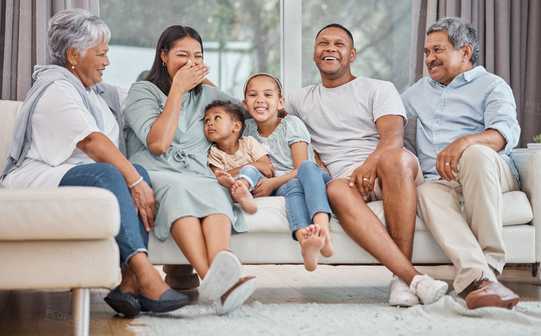 Buy stock photo Laughing, big family and parents with kids for love, care and siblings bonding together. Happy grandparents, mom and dad with children on sofa for funny conversation or joke with generations in home