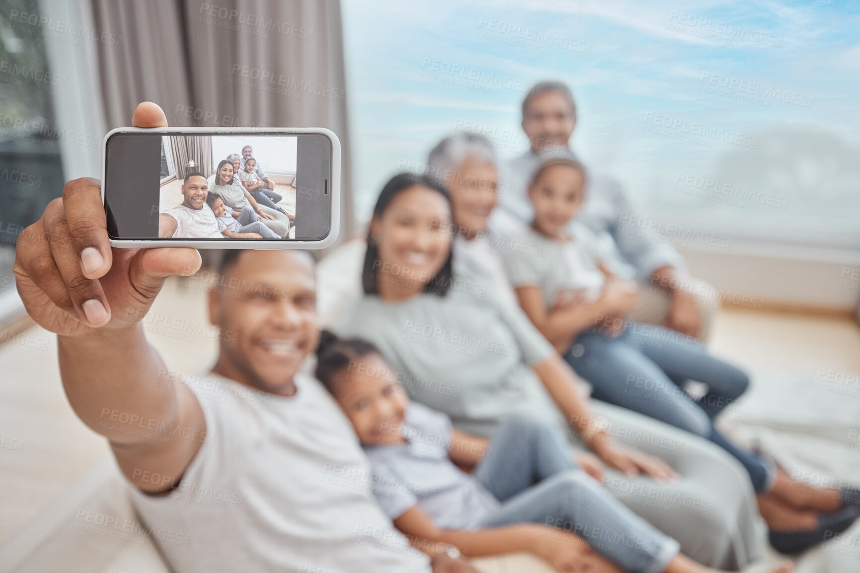 Buy stock photo Selfie, phone screen and happy family in home together for love, care and people bonding. Grandparents, mother and picture of father with children for support, relax and generations in living room