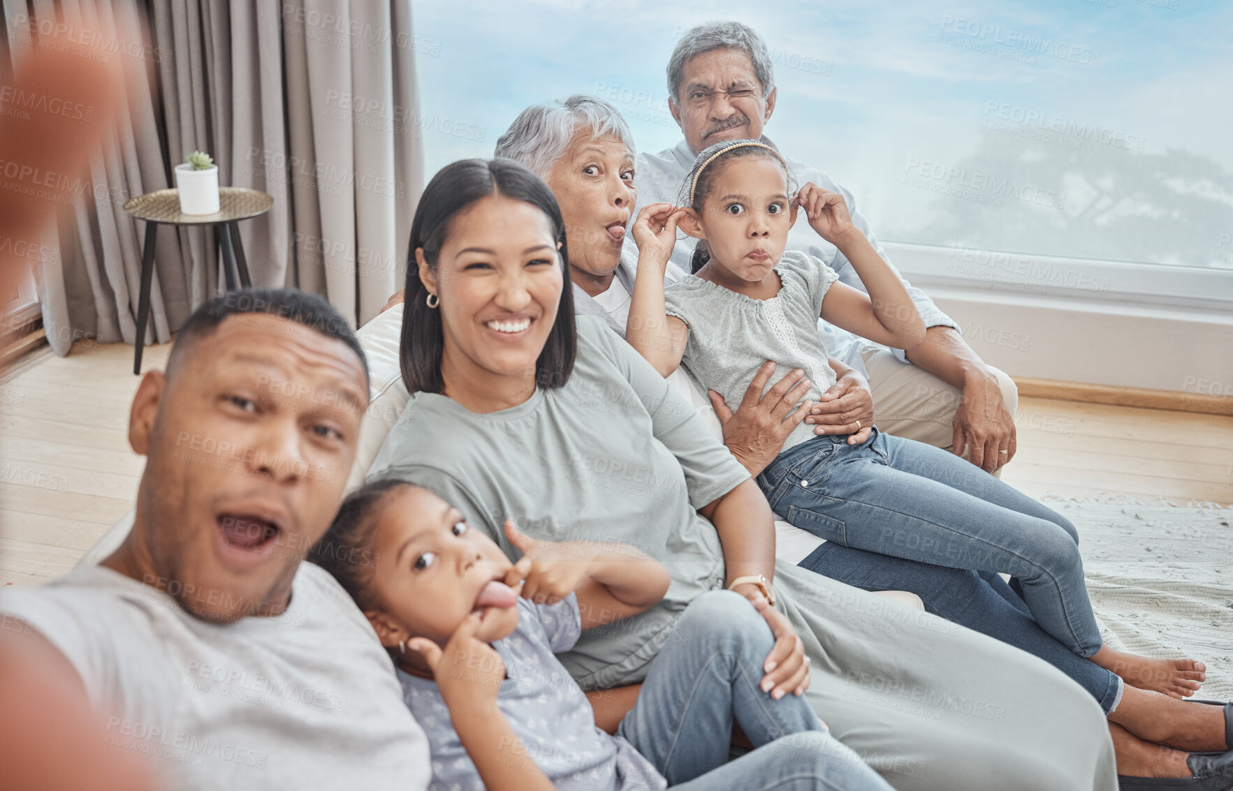 Buy stock photo Portrait, family and funny selfie in home of parents with children for comic, laugh and silly face together. Grandparents, mother and happy father with kids in lounge for pov picture of generations