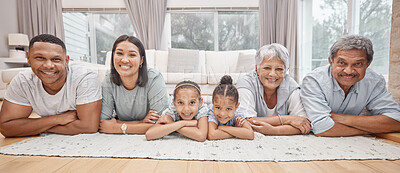 Buy stock photo Portrait, big family and happy parents with children on floor for love, care and sisters bonding together. Grandparents, mom and dad with kids in lounge on carpet to relax with generations in home