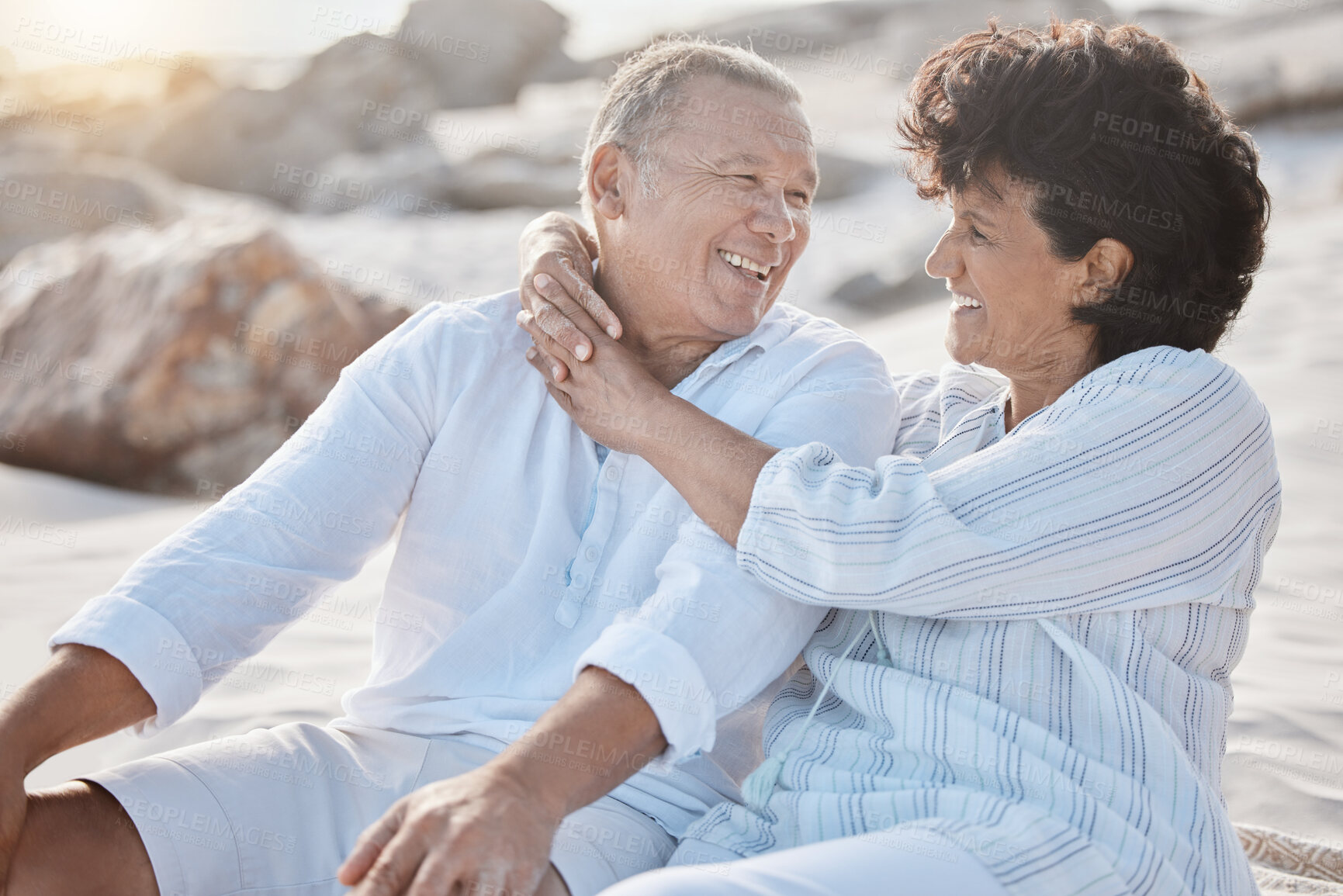 Buy stock photo Happy, beach and senior couple hugging on summer vacation, getaway or holiday for travel. Smile, love and mature man and woman embracing by seaside on tropical weekend trip for anniversary date.