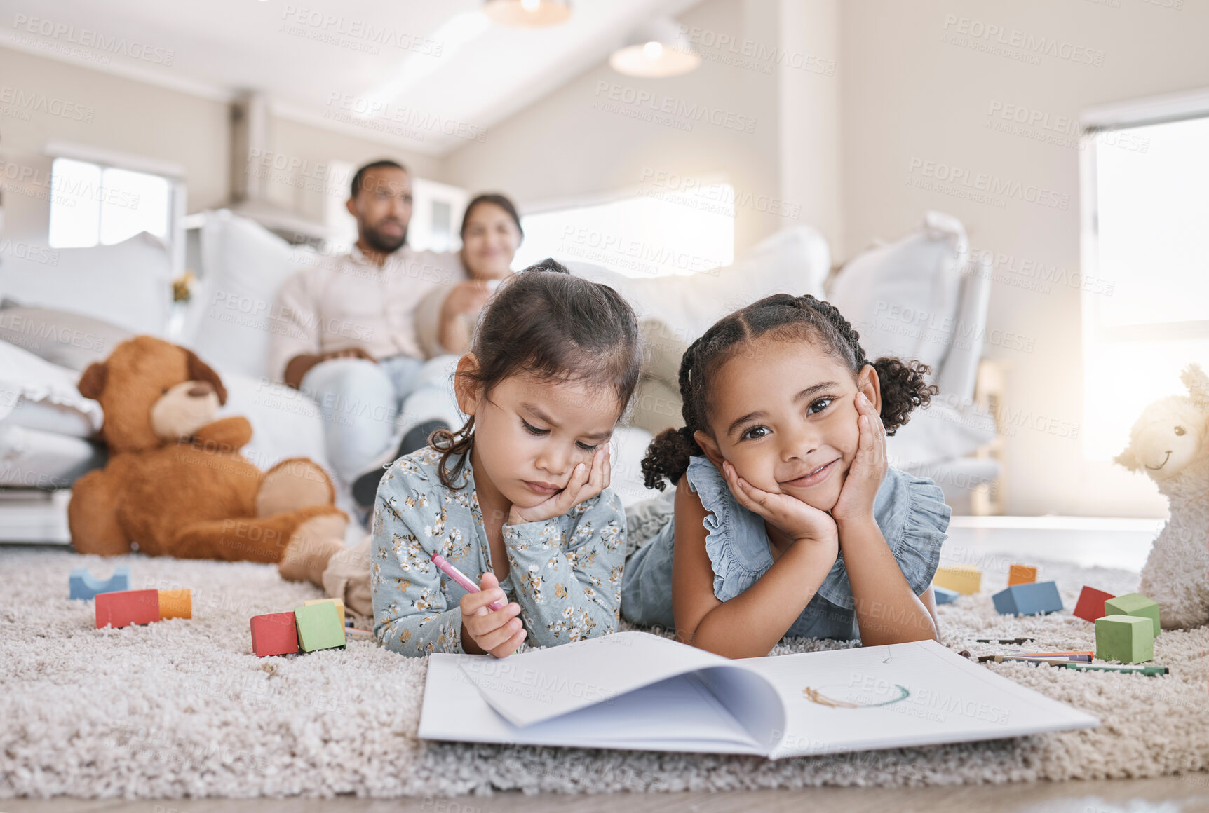 Buy stock photo Relax, parents and children in home with coloring book, teddy bear and toys for development activity. Happy, portrait and girls on floor to play, learn and bonding together with mom and dad on sofa.