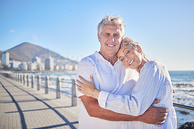 Buy stock photo Portrait, happy and mature couple in beach, hug and bonding in vacation for fresh air, smile or nature. Holiday, old man and woman for romance in Australia, travel and date in ocean, enjoy or weekend