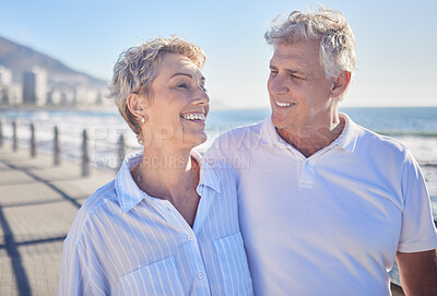 Buy stock photo Bonding, happy and mature couple in beach, hug and water in vacation for fresh air, smile and nature. Holiday, old man and woman for romance in Australia, travel and date in ocean, enjoy and weekend