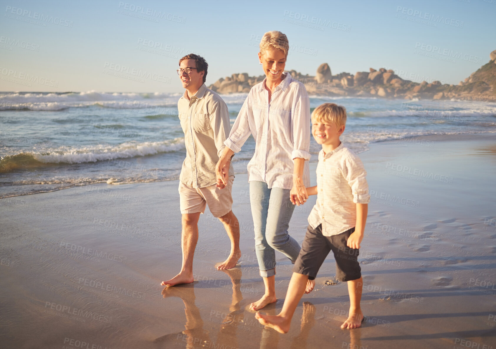 Buy stock photo Parents, boy and smile with walking at beach for bonding, care and love in Mauritius. Family, people and happy with kid for support at seaside on holiday, journey and travel for memories and fun