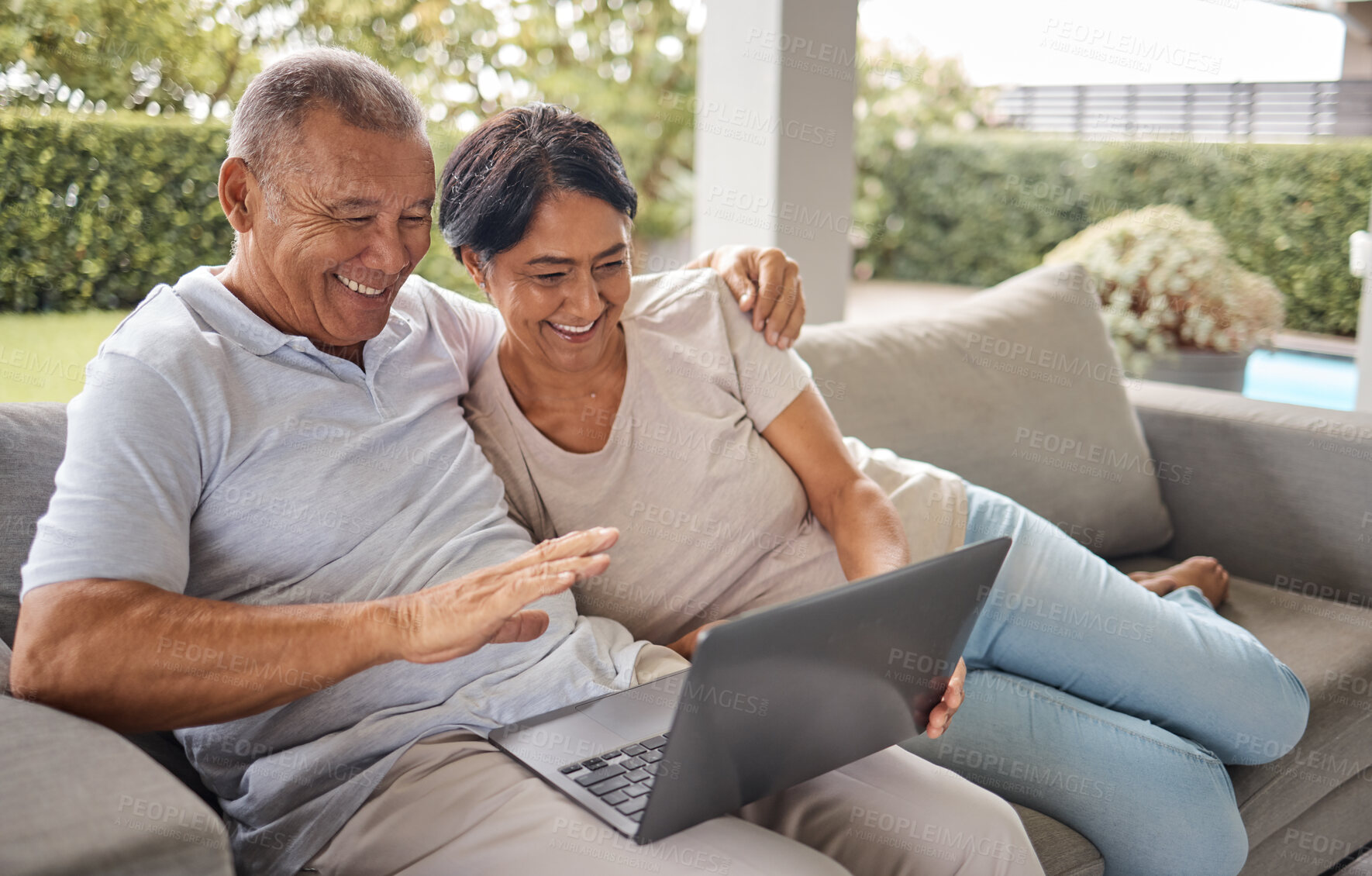 Buy stock photo Senior couple, video call and laptop on home patio with greeting, internet and wave for online talk. Hug, relax and happy people together with website and digital communication with care and hello 