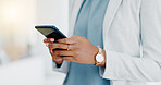 Black woman, hands and phone texting in business for communication, social media or chatting at the office. Hand of African American female typing on smartphone or mobile app for research or chat