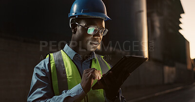 Buy stock photo Construction site, night and black man on tablet in city for planning, building or maintenance. Civil engineering, architecture and person on digital tech for project, infrastructure or manufacturing