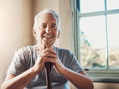 Buy stock photo Smile, walking stick and portrait of senior man in home for confidence, support or wellness. Happy, parkinson and elderly person with disability in assisted living with cane for arthritis at house.