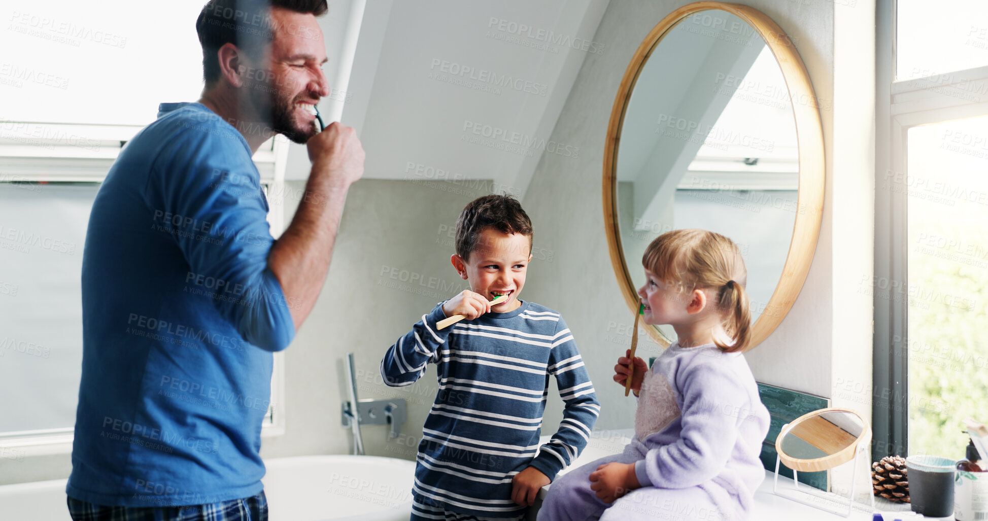 Buy stock photo Dad, bathroom and brushing teeth with children in home for morning routine, dental hygiene and oral health. Father, siblings and teaching with toothbrush for cleaning mouth, bonding and wellness.