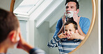 Father, child and shaving with foam in bathroom for mirror reflection, teaching and grooming routine in morning. Man, boy and play with facial cosmetics of skincare, beauty and soap at house together