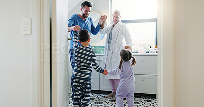 Buy stock photo Happy, family and dancing for fun in bathroom by holding hands, love and bonding together of morning energy. Smile, parents and children with moving development for support, trust and care at house