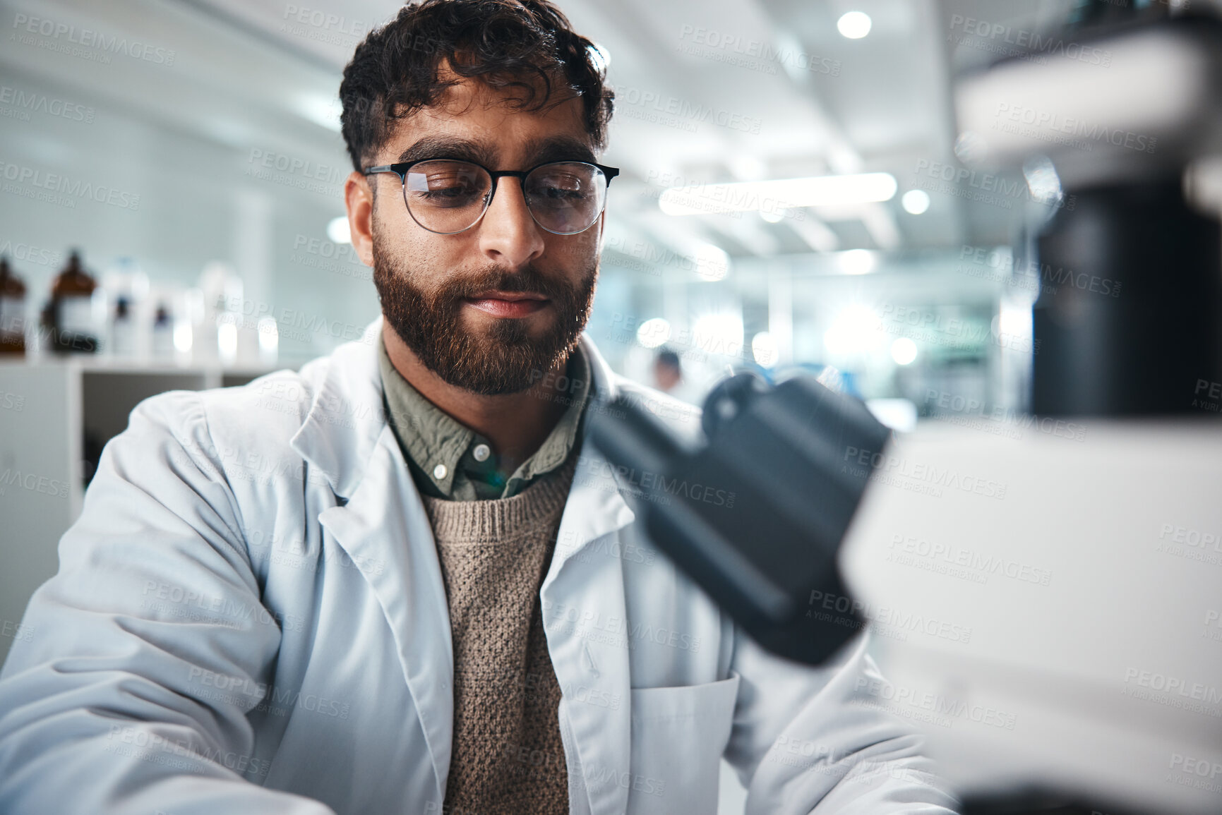 Buy stock photo Scientist, man and microscope for healthcare in lab of experiment research, medical data and studying bacteria. Person, researcher and biotechnology for pharmaceutical development of vaccine solution