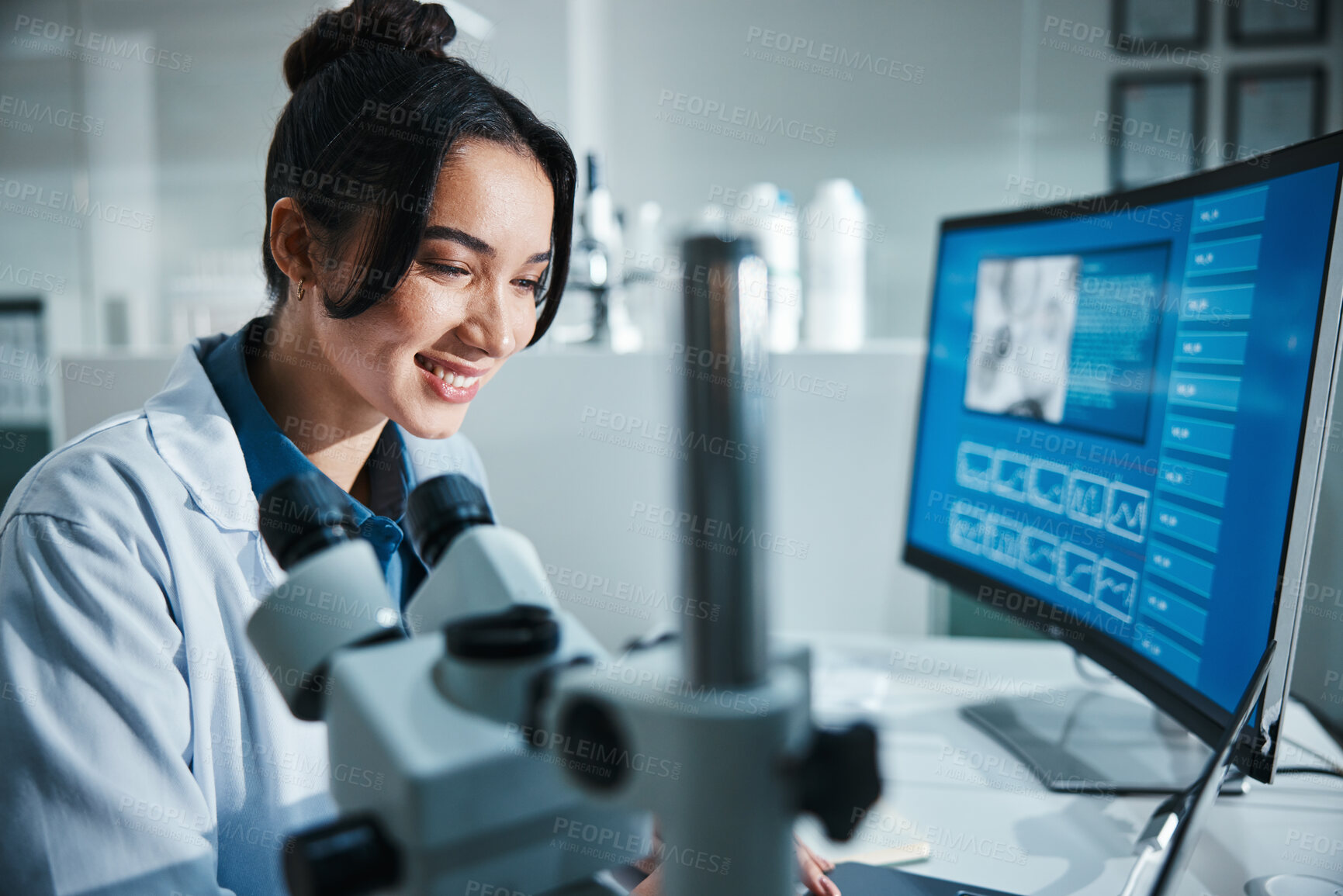 Buy stock photo Computer screen, microscope and smile with scientist in laboratory for development, innovation or research. Pharmaceuticals, science and study with happy woman at work on breakthrough or discovery