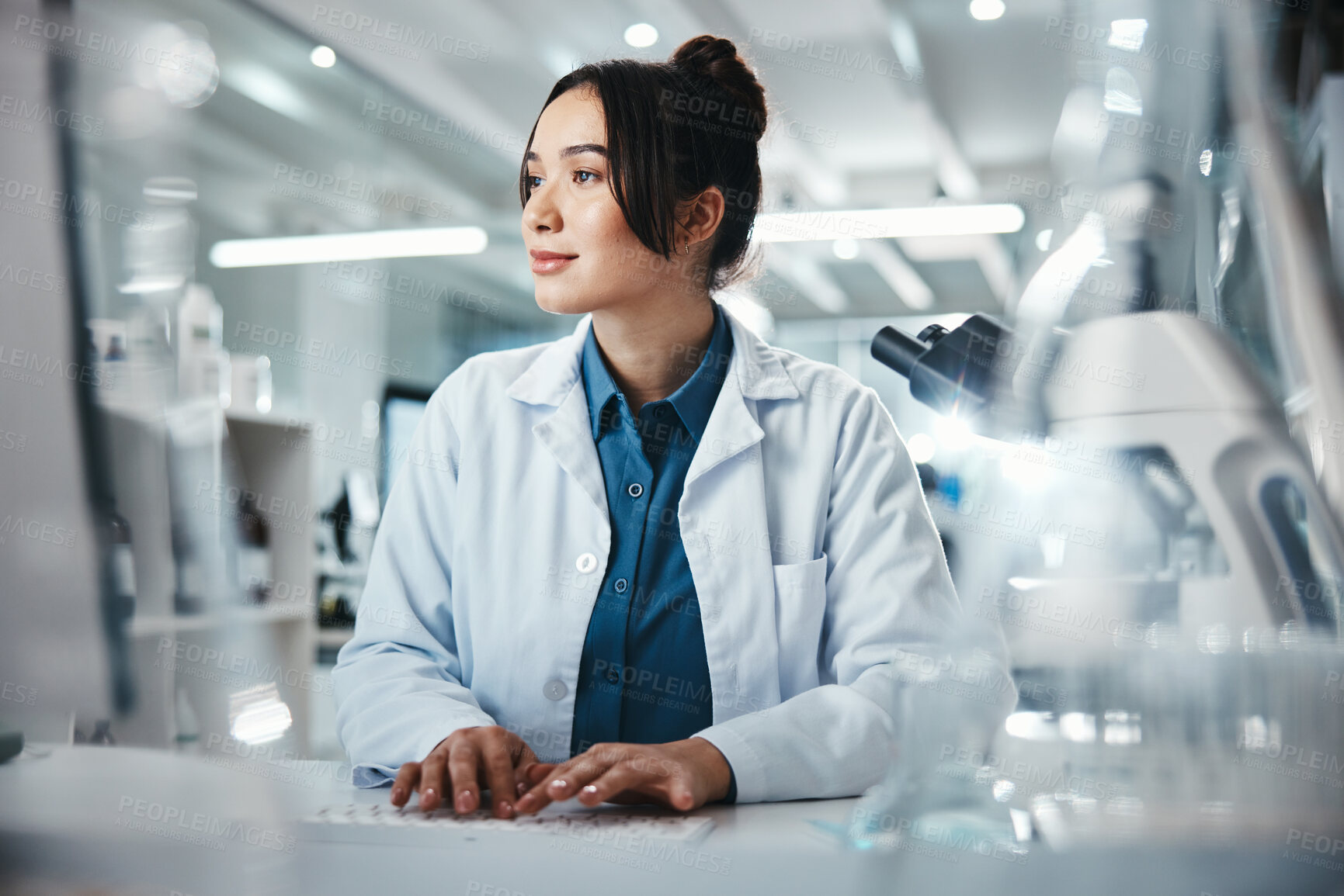 Buy stock photo Computer, science and typing with woman in laboratory for development, innovation or research. Pharmaceuticals, report and study with biology scientist at work on medical breakthrough or discovery