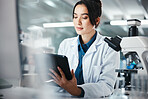 Healthcare, woman and scientist with tablet in lab for microscope research, medical data and science information. Person, researcher and digital for study feedback, vaccine solution and biotechnology