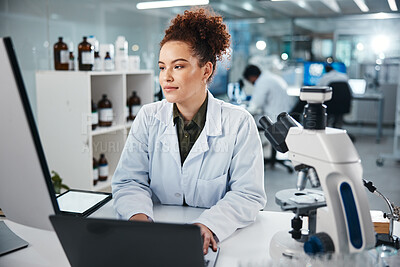 Buy stock photo Computer, DNA and science with woman in laboratory for development, innovation or research. Laptop, microscope and pharmaceuticals with scientist typing at work on medical breakthrough or discovery