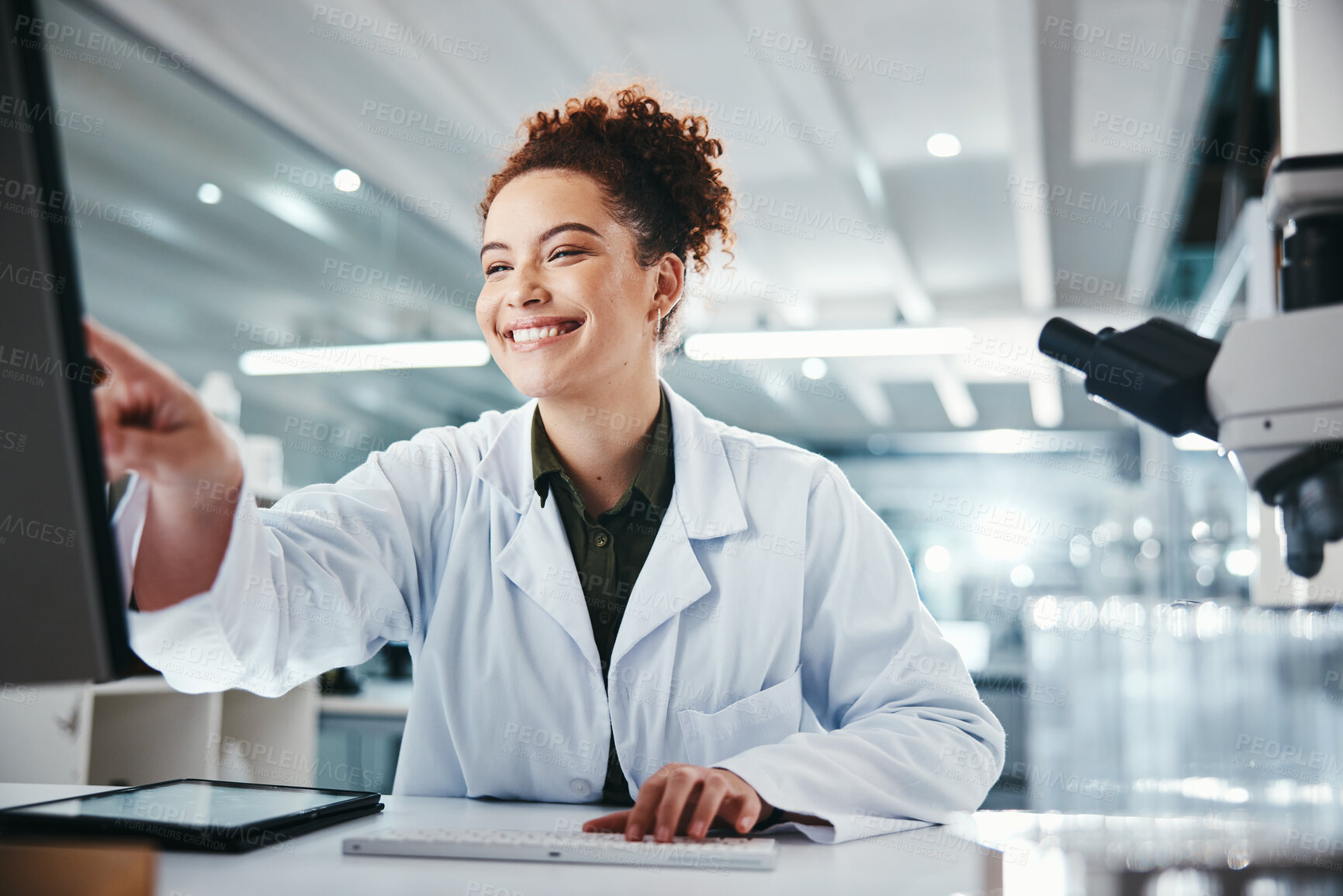 Buy stock photo Computer, science and smile with woman pointing in laboratory for development, innovation or research. Info, pharmaceutical and study with happy scientist at work on medical breakthrough or discovery