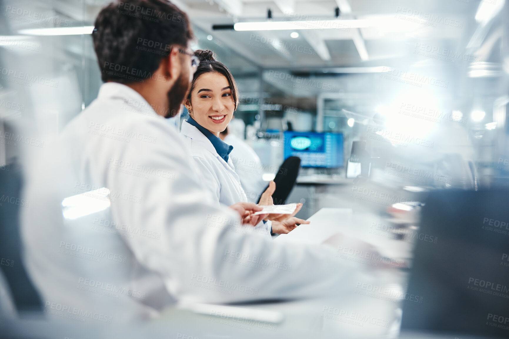 Buy stock photo Laptop, scientist and colleagues with smile, medical research and talking for results of test and discussion. Lab, online and conversation for medicine of healthcare, pharmaceutical and collaboration