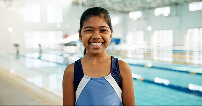 Buy stock photo Girl, child and happy with portrait by pool for indoor swimming lessons, skill development and muscle growth. Female kid, water sports and student for learning, progress and improvement by school.