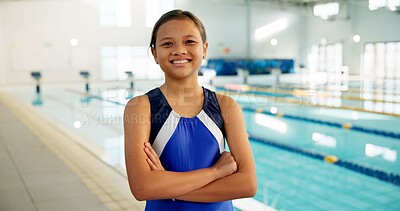 Buy stock photo Portrait, girl and happy with arms crossed at swimming center for training, workout and practice. Female person, kid and smile for sports challenge, tournament and fitness program in confidence