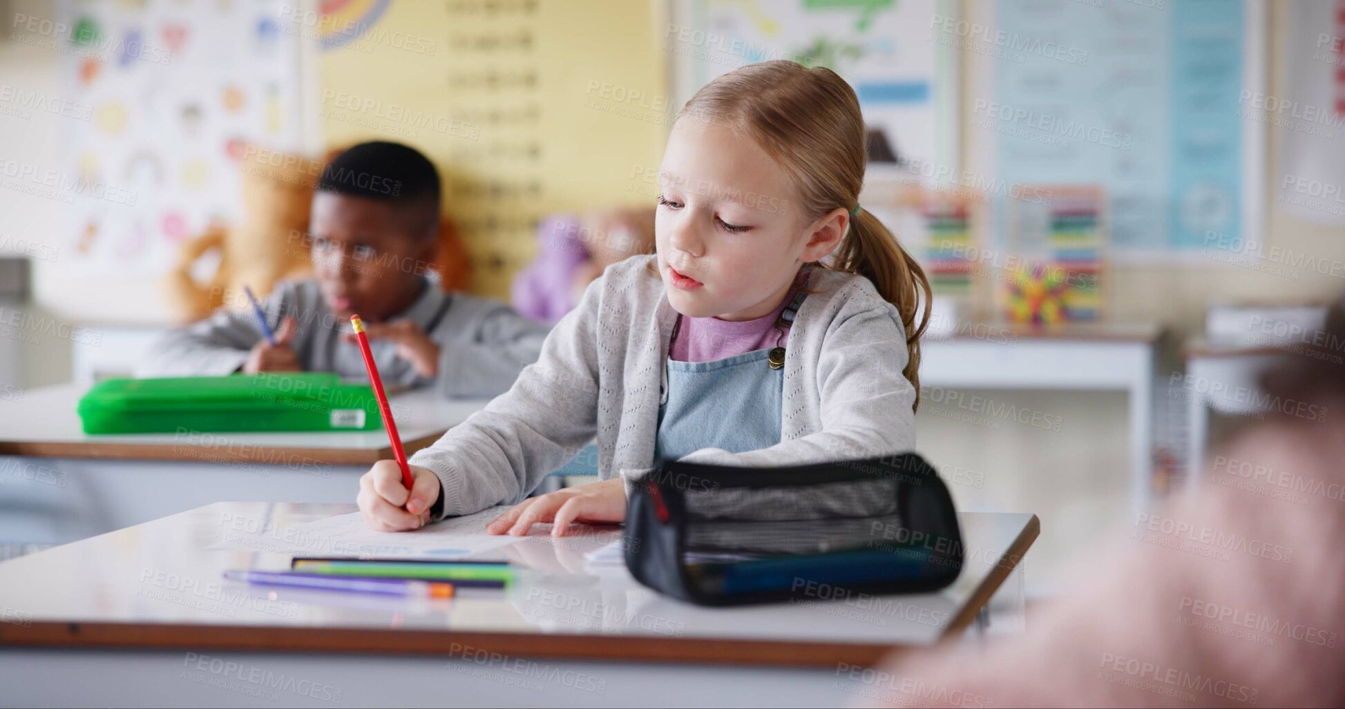 Buy stock photo Girl, child and writing notes in classroom for learning, knowledge and info for assessment. Kid, notebook and education with scholarship, studying and attention at lesson for development at school