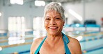 Senior woman, portrait and happy for swimming, wellness and mental health by indoor pool facility. Elderly person, face and smile in retirement with exercise for fitness, arthritis or aquatic therapy