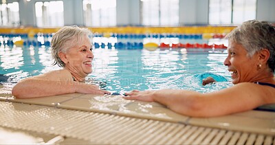 Buy stock photo Senior people, pool and smile for swimming, wellness and mental health by indoor aquatic facility. Friends, conversation and happy in water with retirement for fitness, arthritis and rehabilitation