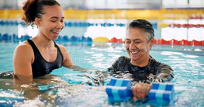 Buy stock photo Dumbbell, training and mature woman in swimming pool for exercise, healthy body and strong muscle. Therapist, water and aerobics class for fitness, physiotherapy or rehabilitation of senior person