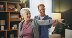 Women, physiotherapy and senior patient with dumbbells for rehabilitation, support and healthcare. People, retirement home and smile for fitness, exercise and training for wellbeing and wellness