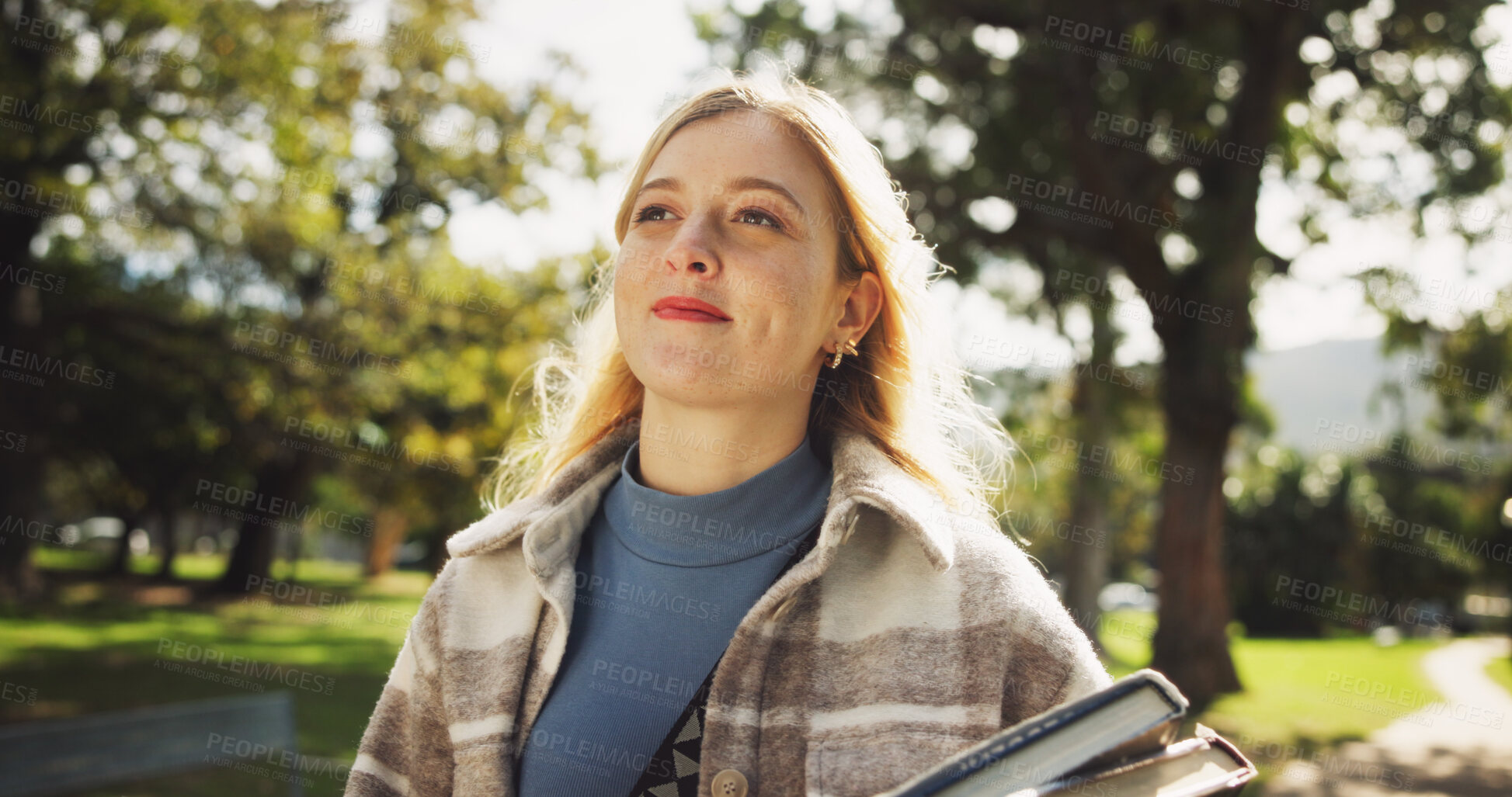 Buy stock photo Student, happy and books outdoor in park for study break, mental health and fresh air with backpack. Woman, smile and sunshine at campus, university or college for education, learning and scholarship