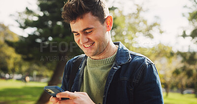 Buy stock photo Student, man and phone with reading, park and reminder for class for education, learning and chat at campus. Person, smartphone and outdoor on path with backpack for scholarship at college in Italy