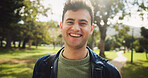 Student, happy and portrait outdoor in park for study break, mental health and fresh air with backpack. Man, smile and face at campus, university or college for education, learning and scholarship