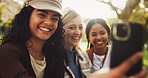 Women, friends and selfie in park with smile, memory or together with diversity for post on social media. Girl, group and happy with photography, nature and profile picture with mobile app in Brazil